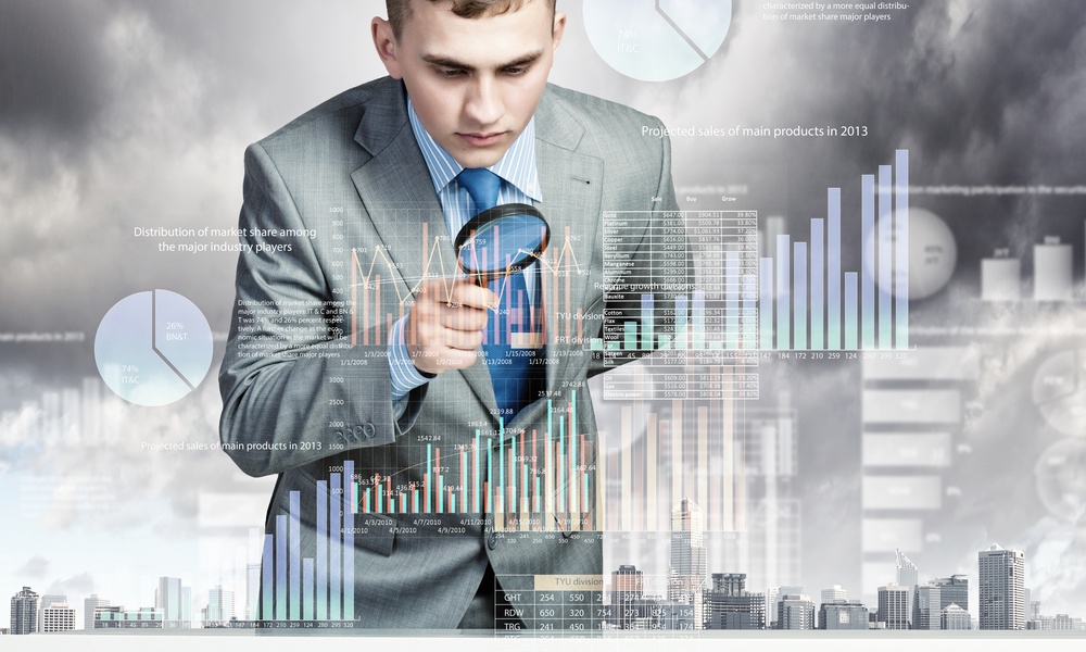Image of businessman examining